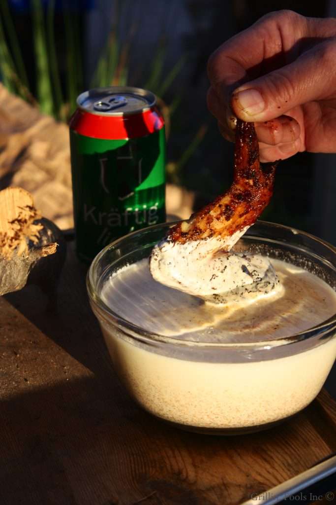 Chicken Wings Dunked in the Alabama White Sauce